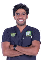 Smiling doctor with a white coat and stethoscope, representing the reliable medical professionals at Dawi.